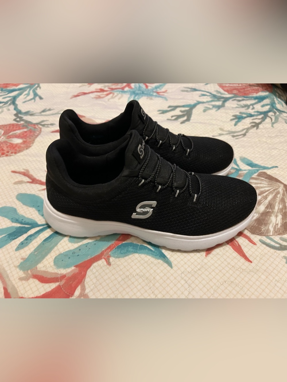 Skechers Women’s Black Knit Slip-On Sneakers with White Sole